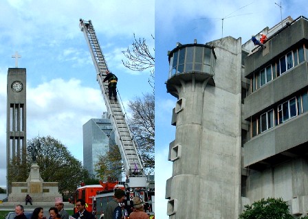 50th anniversary celebrations - descent of Palmerston North City Council building and ascent of a ladder - of Sir Edmund Hillary and Tenzing Norgay's climb to the top of Mt Everest. The Square, Palmerston North, Manawatu, New Zealand - 29 May 2003