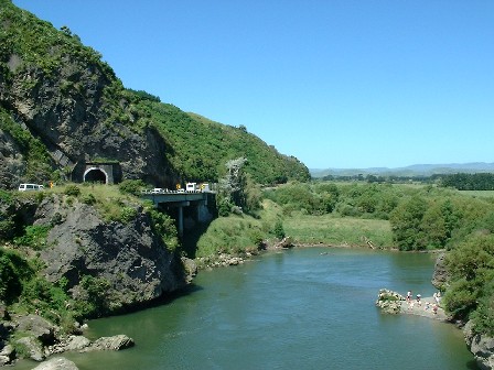 Spot the sunbathers below?  Photo taken from Ballance Bridge over Manawatu River, looking towards Tararua district, New Zealand - 1 January 2004