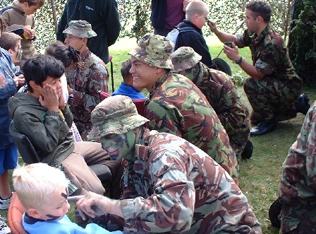 Face painting is not just for kids. Thousands turned out for the Linton Camp Open Day 2004. Linton, Manawatu, New Zealand - 28 March 2004