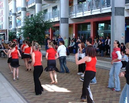 Students, taking a break, have an on-the-spot lesson in 'Street Latin' dance, in the comfort of UCOL's Atrium, Palmerston North, Manawatu, New Zealand - 30 March 2004