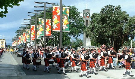 Through the middle of Palmerston North's revamped 'The Square' goes 2005's city Christmas Parade, Palmerston North, Manawatu, New Zealand - 3 December 2005